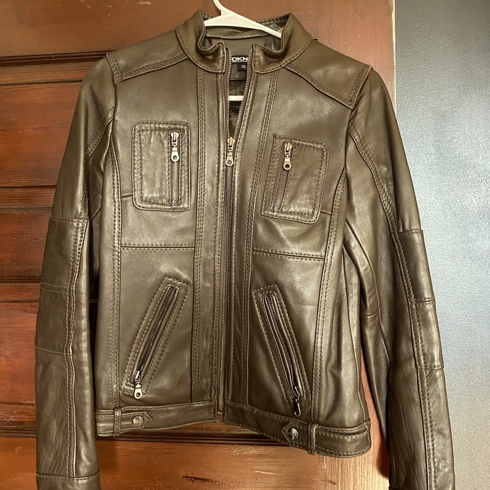 Womens leather jacket. Made by DKNY. Size XS. Brown. Excellent condition